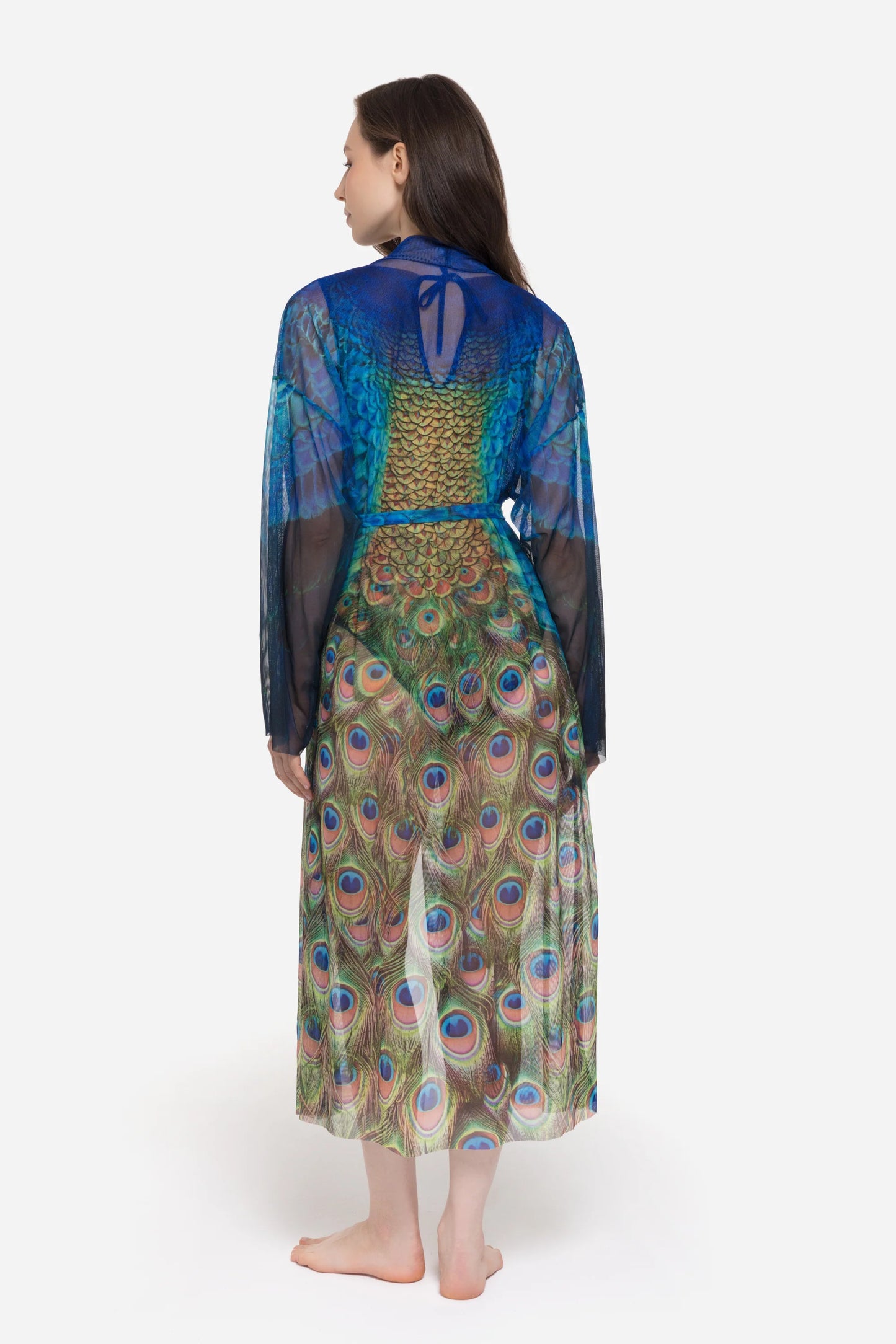 Designer long-sleeved sheer maxi beach robe with a vibrant peacock feather print, featuring a blue gradient top and a green patterned bottom | RODA