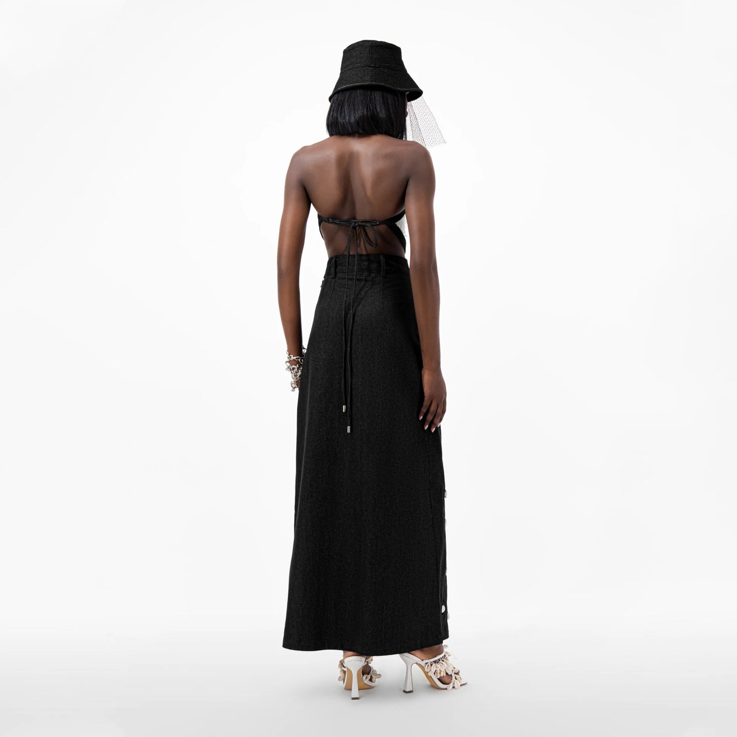Designer Cowrie Detail Denim Maxi Skirt in Black color | ÚCHÈ
Designer Sequin Denim Detail Crop Top in Cream color with Black denim detail | ÚCHÈ