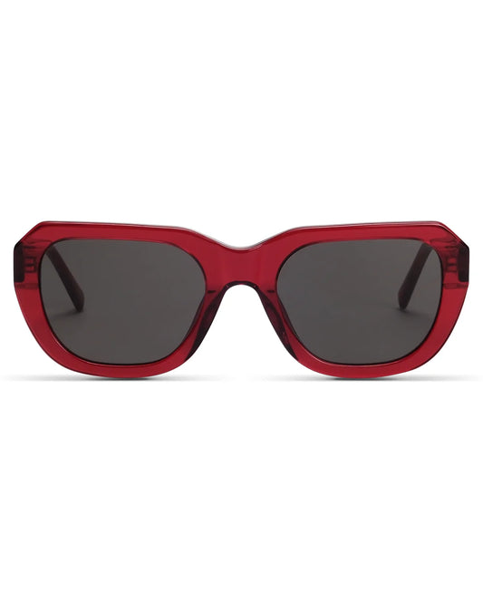 Red sunglasses with dark lenses on a white background
