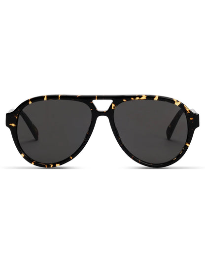 Sunglasses with tortoiseshell frame and dark lenses on a white background