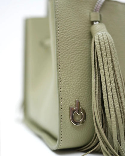 Designer olive green leather bucket bag with a top handle and drawstring closure | ALLBYB