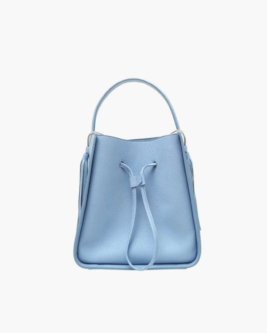 Designer light blue leather bucket bag with a top handle and drawstring closure | ALLBYB