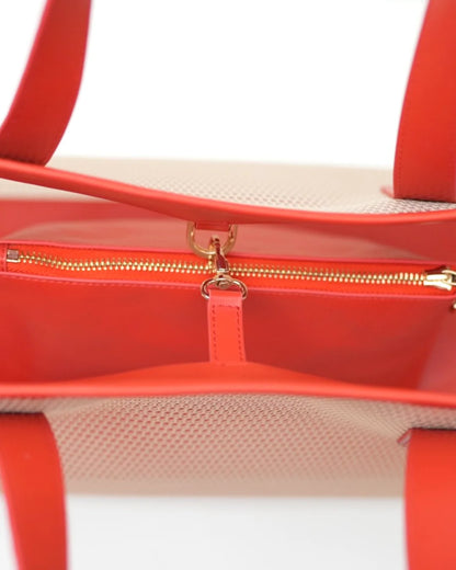 Structured designer mesh tote bag with a warm beige body and bright coral-red handles and trim | ALLBYB