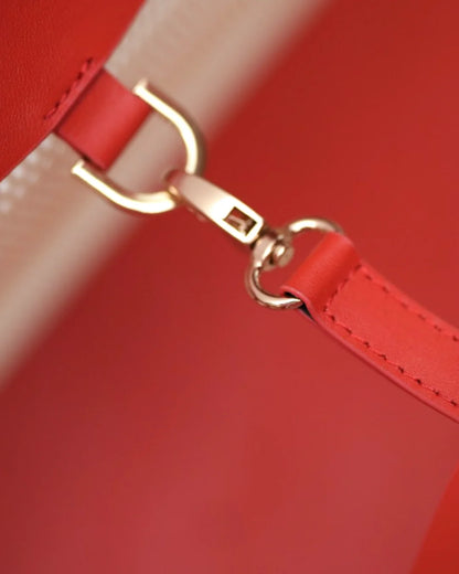 Structured designer mesh tote bag with a warm beige body and bright coral-red handles and trim | ALLBYB