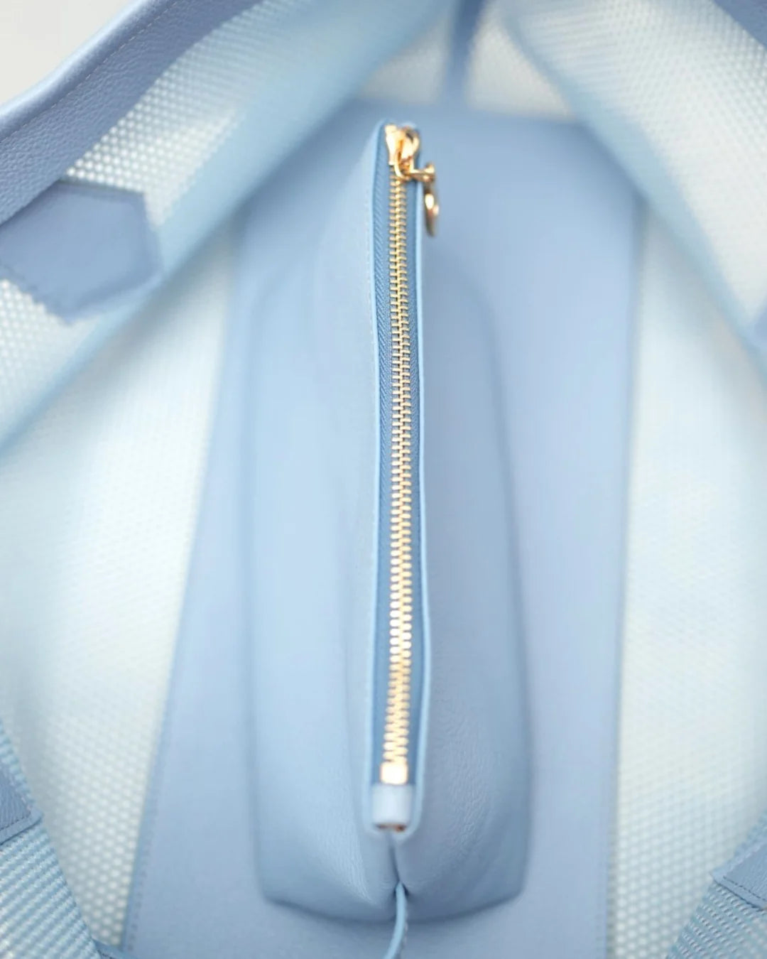 Structured designer mesh tote bag with a blue body, handles and trim | ALLBYB