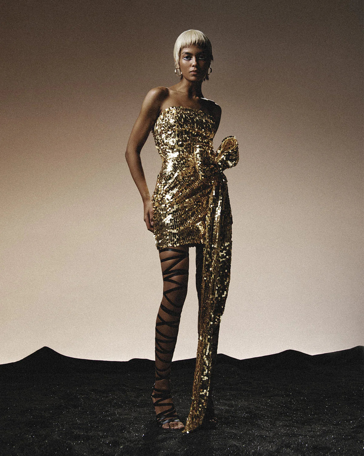 Gold sequin designer mini dress with a bow | LIKA luxury brand