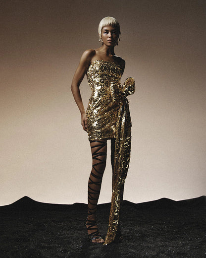 Gold sequin designer mini dress with a bow | LIKA luxury brand