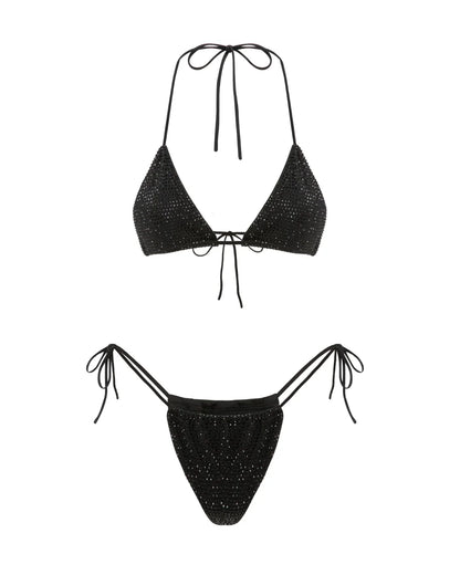 Black bikini set with sparkling details on a white background