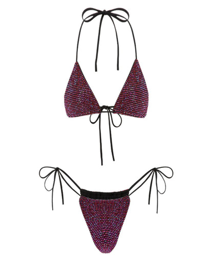 Purple sparkling bikini set with black straps on a white background