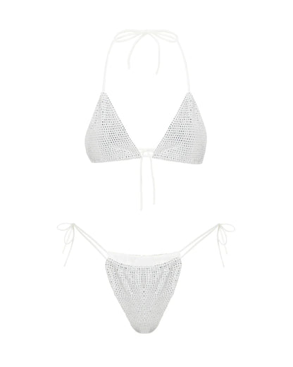 White bikini set with sparkling stones on a white background