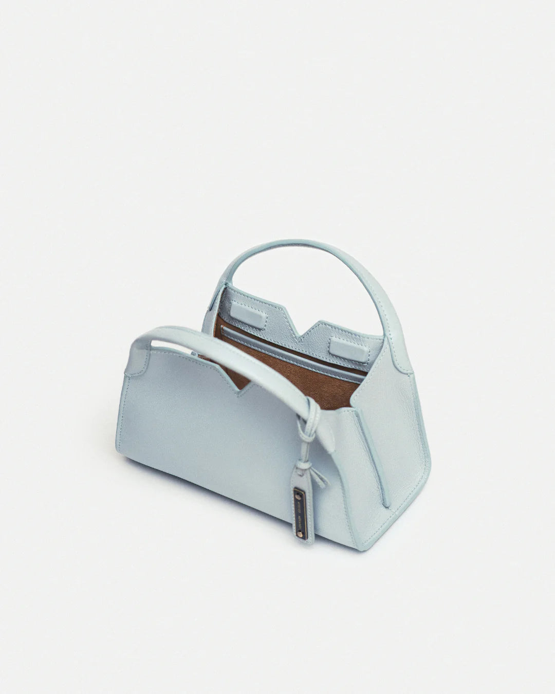 Woven leather designer handbag with hand dyed pastel baby blue color | MERANDI Thai luxury handbag brand made of Italian leather