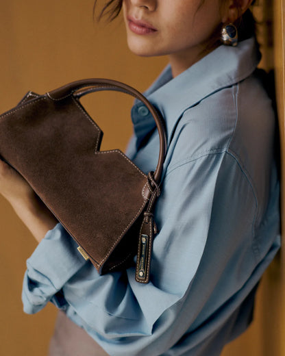 Woven leather designer handbag with hand dyed chestnut color | MERANDI Thai luxury handbag brand made of Italian leather