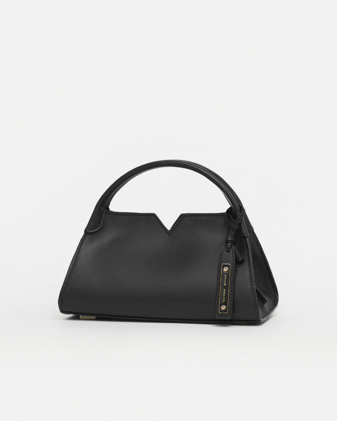 Woven leather designer handbag with hand dyed black color | MERANDI Thai luxury handbag brand made of Italian leather