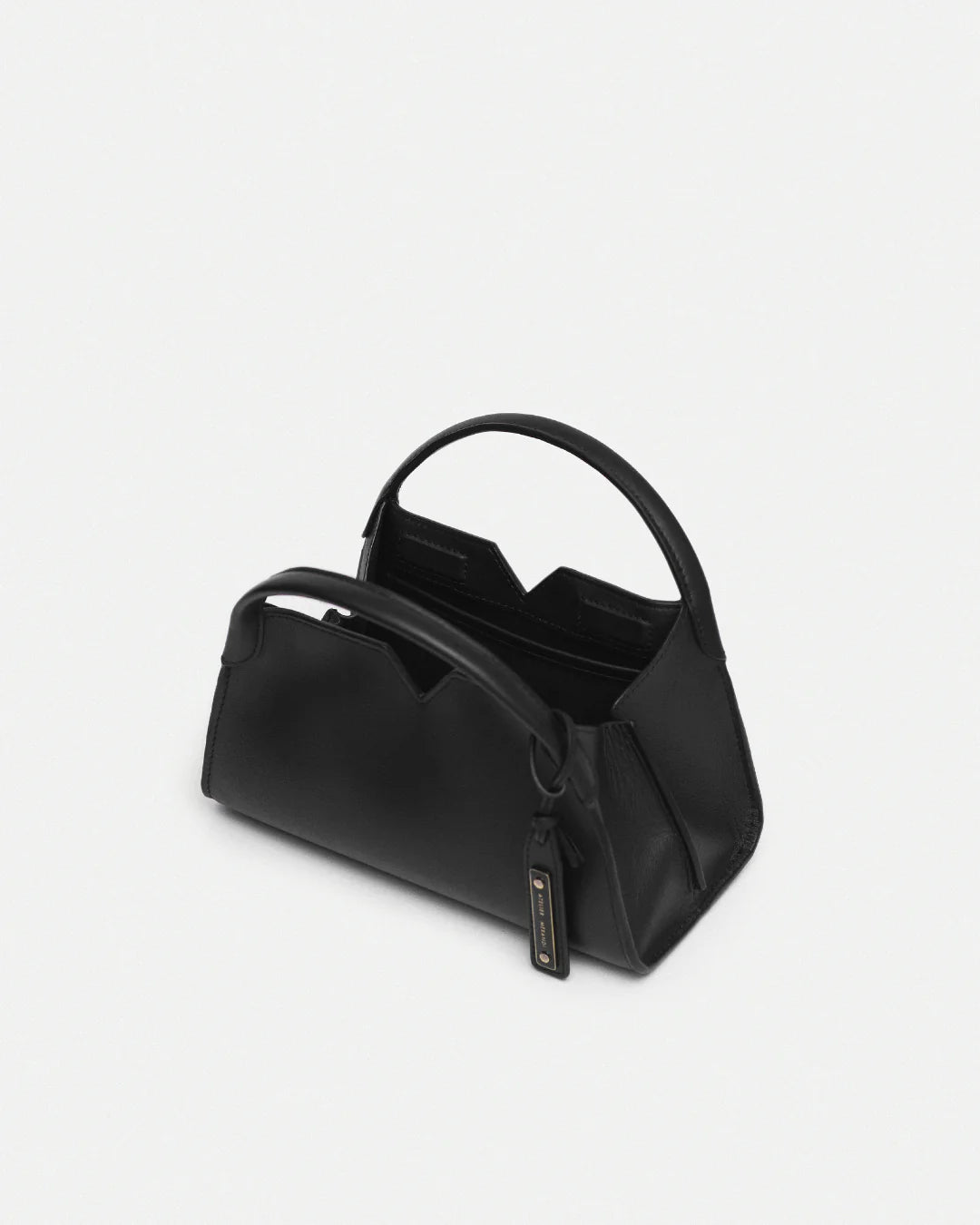 Woven leather designer handbag with hand dyed black color | MERANDI Thai luxury handbag brand made of Italian leather
