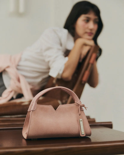 Woven leather designer handbag with hand dyed pastel pink color | MERANDI Thai luxury handbag brand made of Italian leather