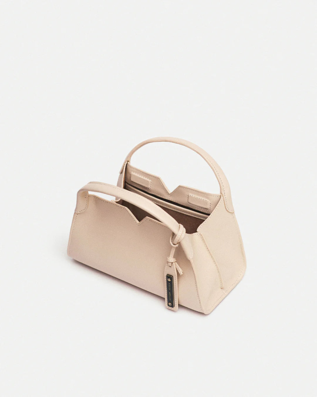 Woven leather designer handbag with hand dyed cream color | MERANDI Thai luxury handbag brand made of Italian leather