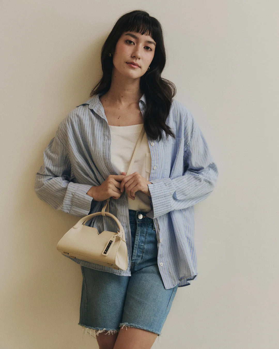Woven leather designer handbag with hand dyed cream color | MERANDI Thai luxury handbag brand made of Italian leather