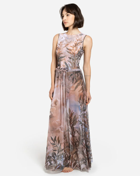 Designer maxi sheer beach skirt with a botanical leaf print in muted tones of dusty pink, taupe, brown, and soft blue-gray | RODA