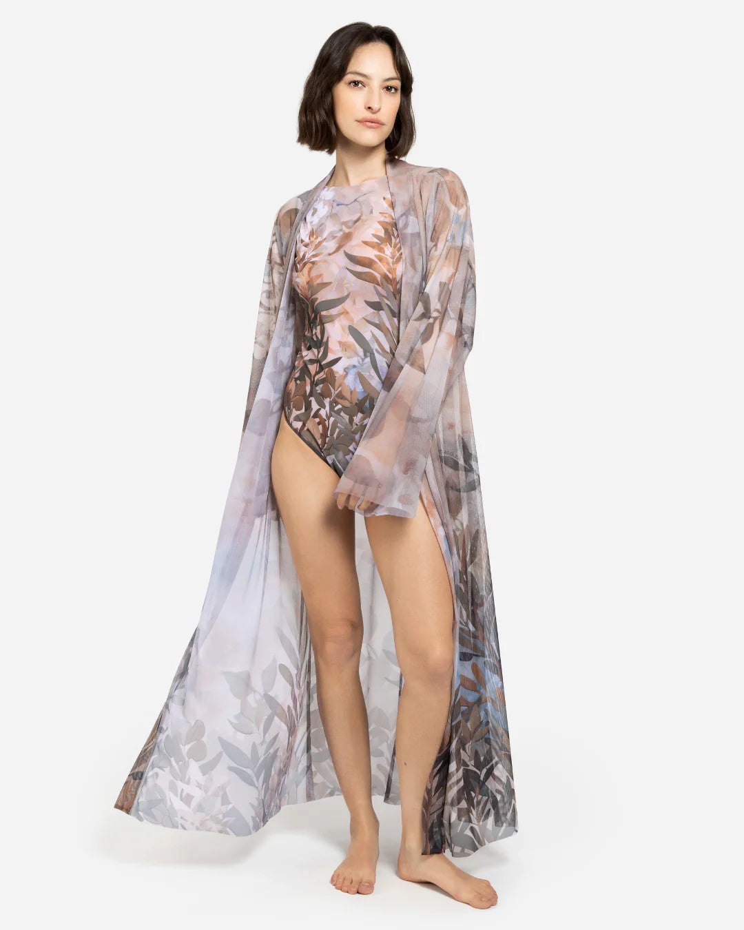 Designer sheer beach robe with a botanical leaf print in muted tones of dusty pink, taupe, brown, and soft blue-gray | RODA