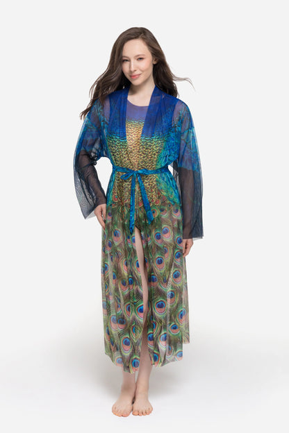 Designer long-sleeved sheer maxi beach robe with a vibrant peacock feather print, featuring a blue gradient top and a green patterned bottom | RODA