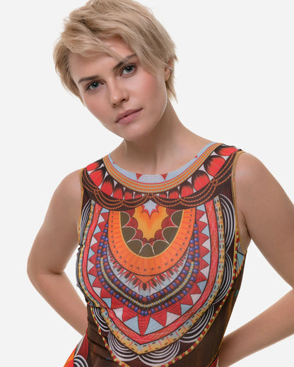 Designer sleeveless one-piece swimsuit with sheer mesh front and an intricate, colorful African dashiki-inspired geometric print in orange, red, yellow, brown, and white | RODA