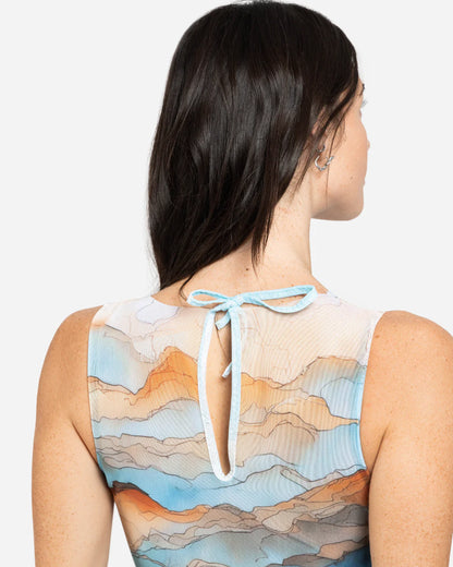 Designer sleeveless one-piece swimsuit with a scenic abstract print of blue, orange, and beige mountains | RODA