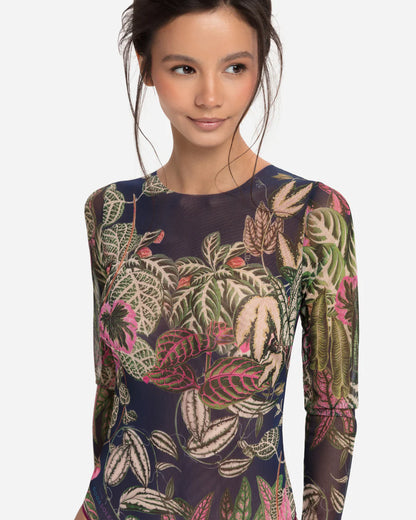 Designer long-sleeve one-piece swimsuit with a botanical jungle print on a sheer mesh fabric, featuring a dusty blue-gray base color with green, pink, and beige leaves | RODA