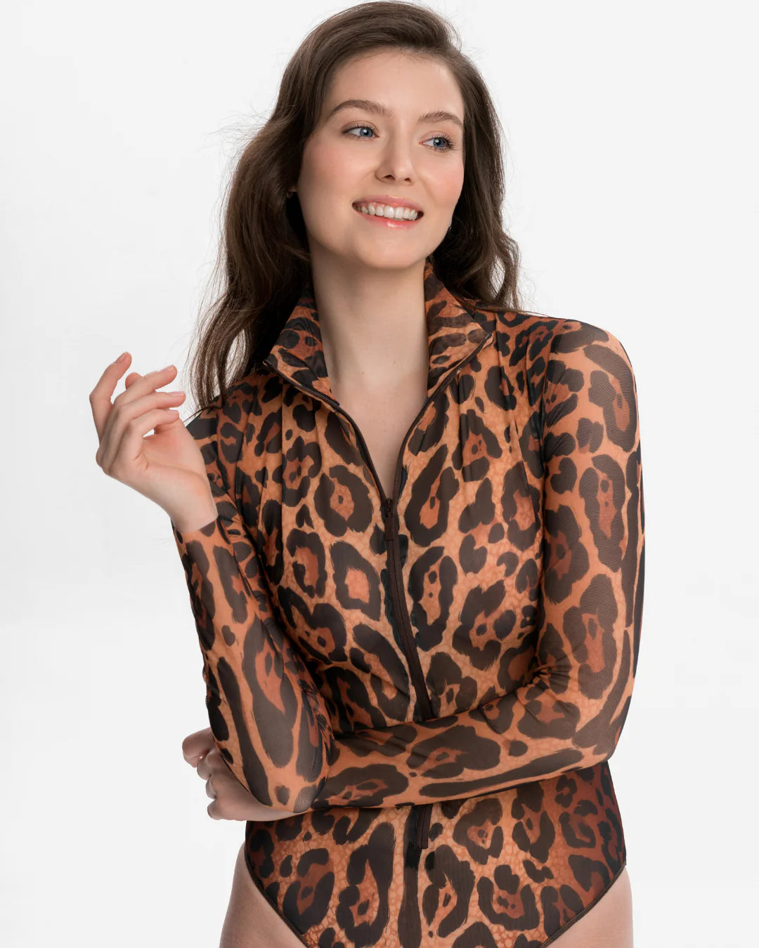 Designer long-sleeve swimsuit with a leopard print pattern in shades of brown, tan, and black, featuring a high mock neck and a front zipper | RODA