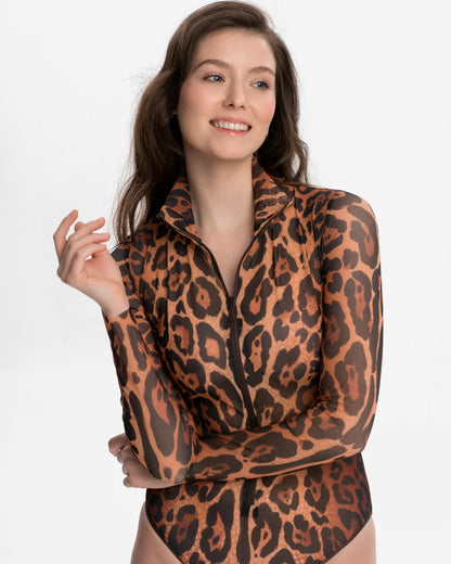 Designer long-sleeve swimsuit with a leopard print pattern in shades of brown, tan, and black, featuring a high mock neck and a front zipper | RODA