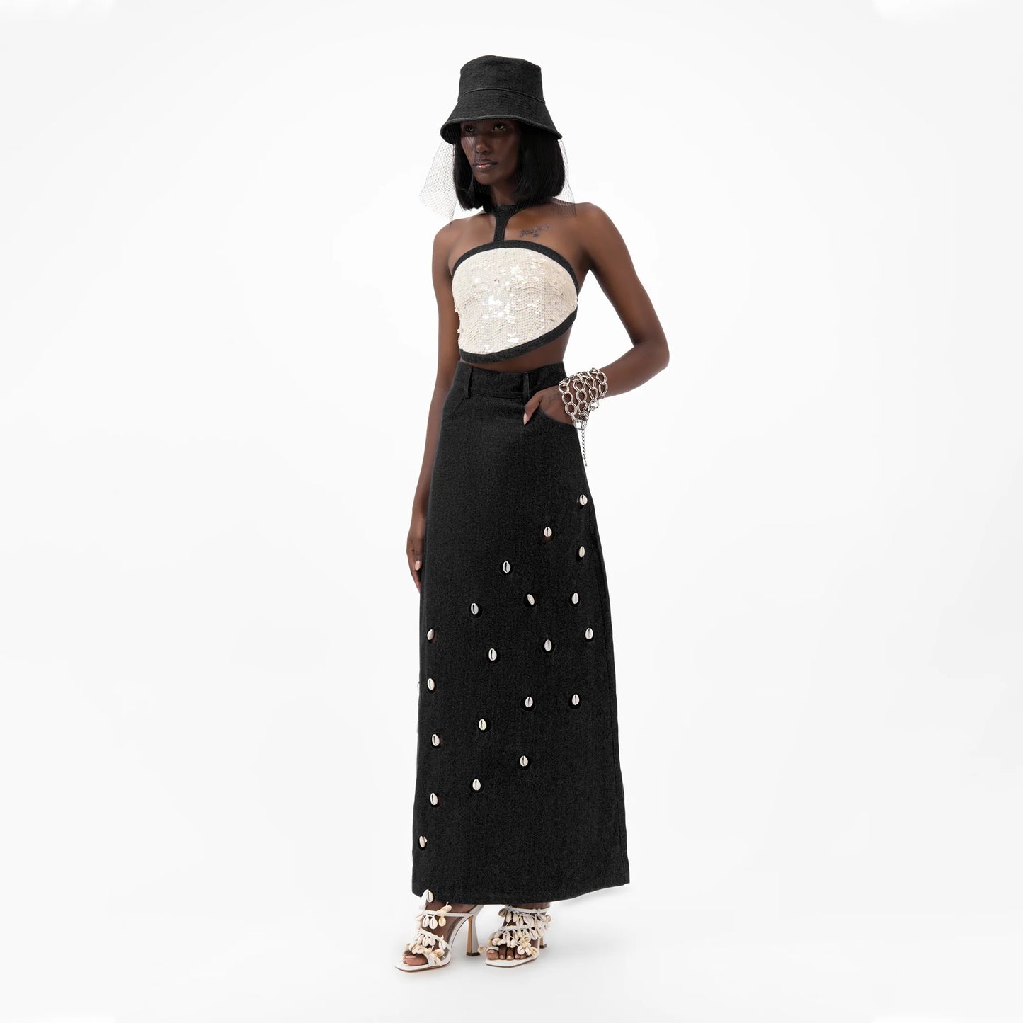 Designer Cowrie Detail Denim Maxi Skirt in Black color | ÚCHÈ
Designer Sequin Denim Detail Crop Top in Cream color with Black denim detail | ÚCHÈ