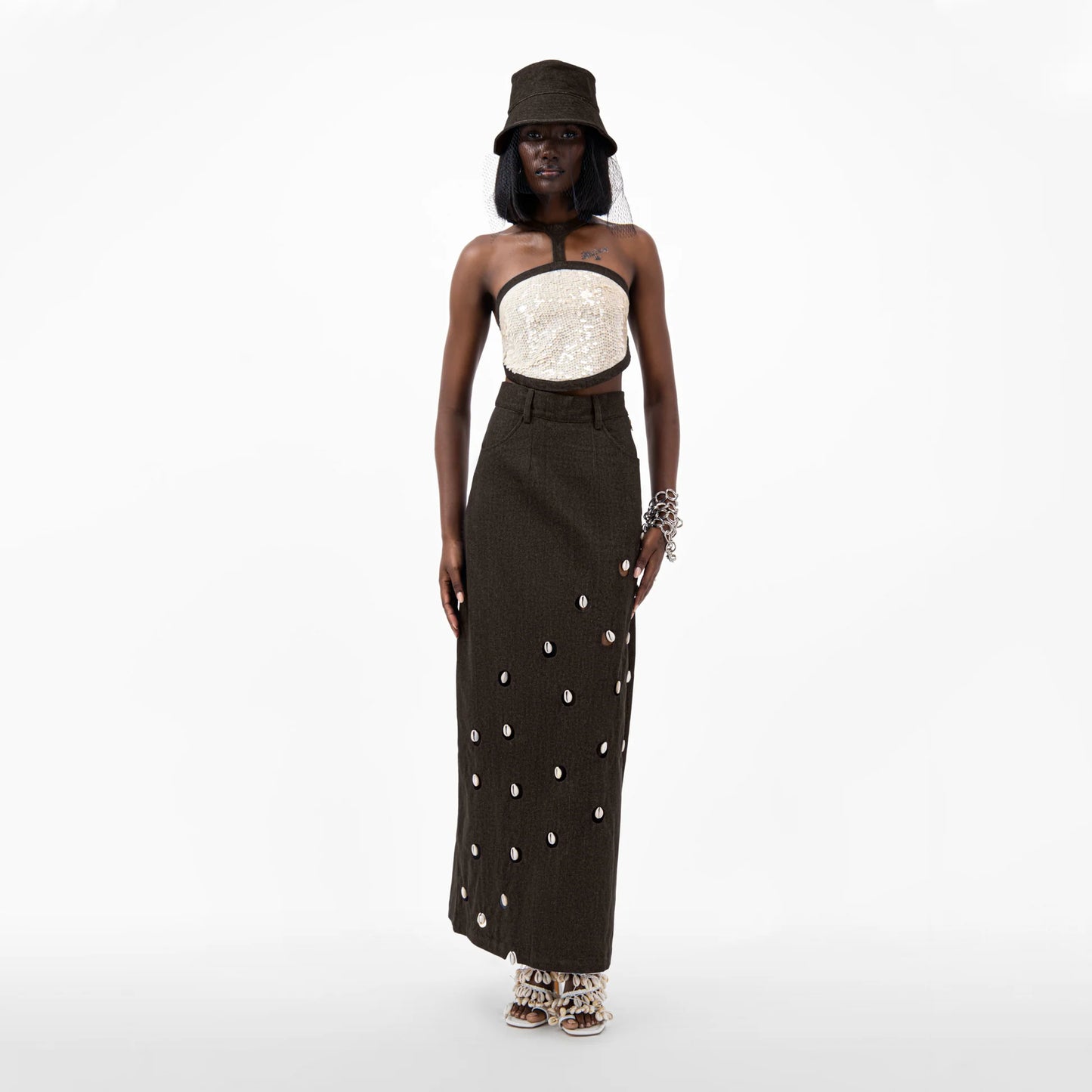 Designer Cowrie Detail Denim Maxi Skirt in Brown color | ÚCHÈ
Designer Sequin Denim Detail Crop Top in Cream color with Brown denim detail | ÚCHÈ