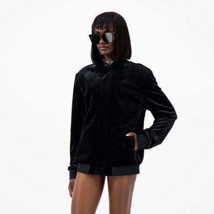 Designer velvet women's jacket with a pointed collar, long sleeves, and ribbed cuffs and hem in Black | ÚCHÈ