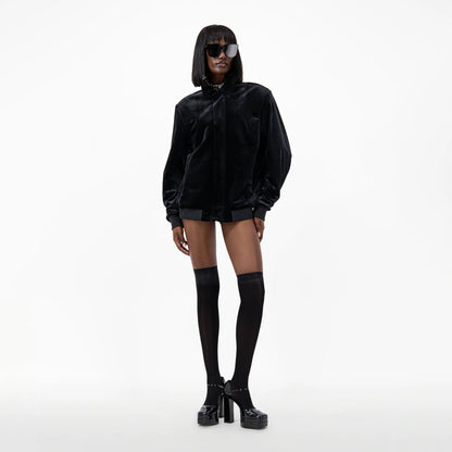 Designer velvet women's jacket with a pointed collar, long sleeves, and ribbed cuffs and hem in Black | ÚCHÈ